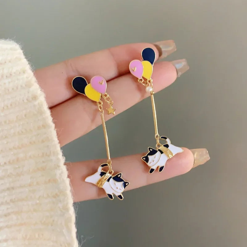 Pour a Little Joy into Your Day – Asymmetric Teacup Kitten Tassel Earrings for Playful Charm That Warms the Heart
