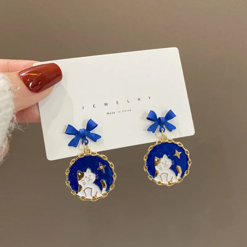Pour a Little Joy into Your Day – Asymmetric Teacup Kitten Tassel Earrings for Playful Charm That Warms the Heart