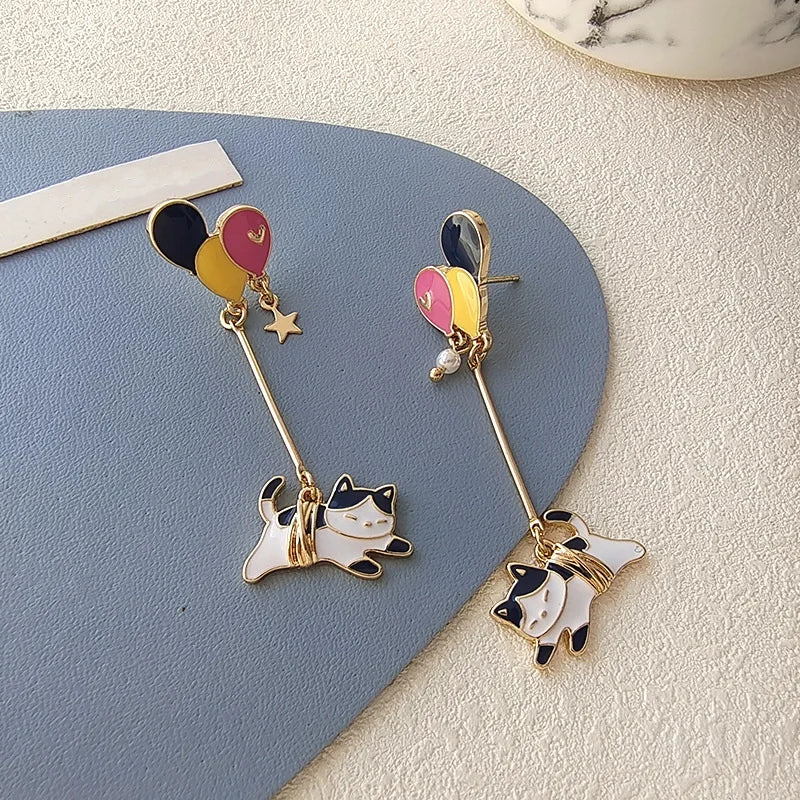 Whispers of the Night – Asymmetric Sleeping Cat & Moon Earrings That Tell a Story of Dreamy Devotion