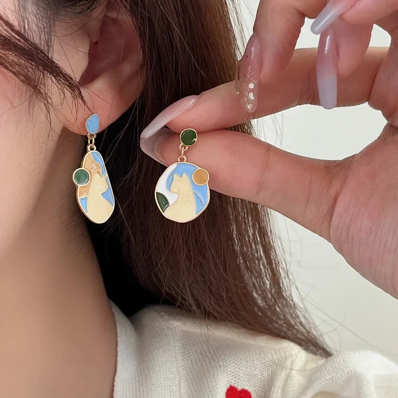 Pour a Little Joy into Your Day – Asymmetric Teacup Kitten Tassel Earrings for Playful Charm That Warms the Heart