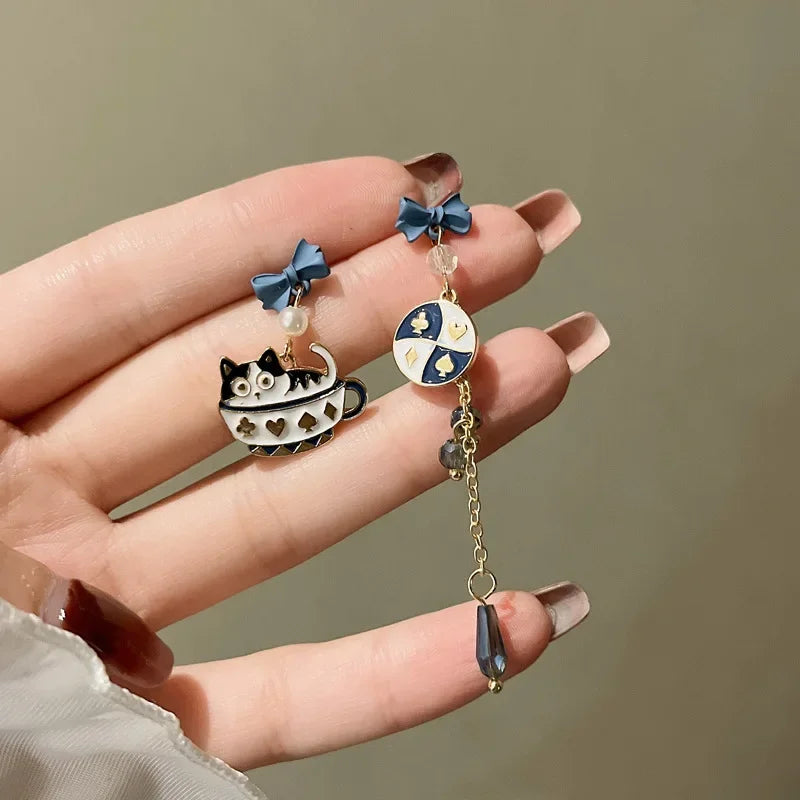 Pour a Little Joy into Your Day – Asymmetric Teacup Kitten Tassel Earrings for Playful Charm That Warms the Heart