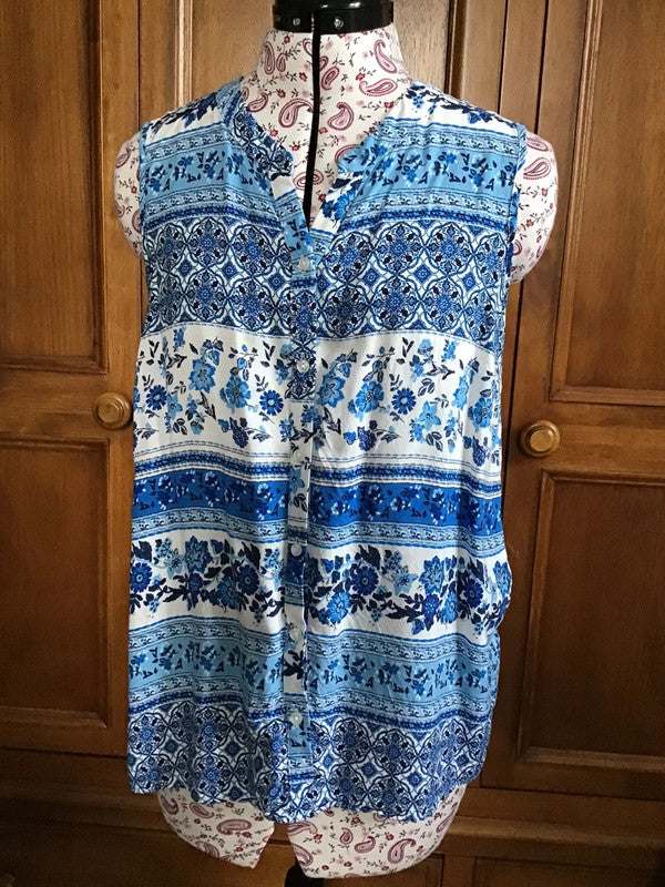 Blue and white sleeveless blouse
