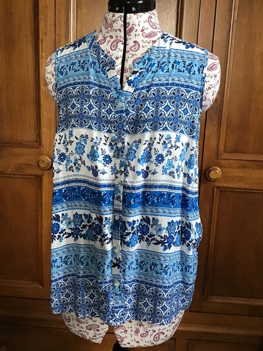 Blue and white sleeveless blouse