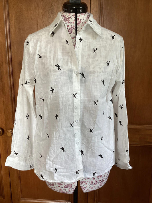 White shirt with bird pattern