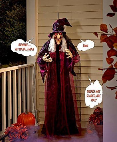 Life-Size Talking Witch animatronic hanging on porch display